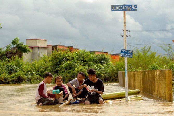 Floods and landslides in Indonesia have killed at least 59 people, the government said Friday, after heavy rain pounded Sulawesi island and forced thousands to flee their homes    